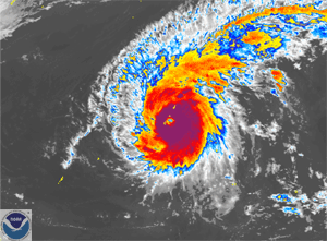 satellite image of Super-Typhoon Pongsona impacting Guam on December 8, 2002