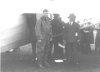 Charles Lindbergh posing with his plane
