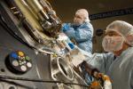 Lockheed Martin Space Systems technicians work on the science deck of NASA's Phoenix Mars Lander
