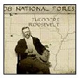 [photo] Teddy Roosevelt in front of national forest map, circa 1908.