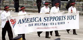 WASHINGTON, Jan. 20, 2005 - When the "Georgia Bridgemen" band from Lowndes High School in Valdosta, Ga., marched down Pennsylvania Avenue in the inaugural parade, they proudly carried a message for U.S. servicemembers around the world. Defense Dept. photo by Kathleen T. Rhem