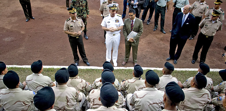 U.S. Navy Adm. Michael G. Mullen, chairman of the Joint Chiefs of Staff, greets the Salvadoran Army's Cuscatlan Battalion who are training to deploy to Iraq in support of Operation Iraqi Freedom, Jan.18, 2008. Mullen's visit to El Salvador wraps up a five-day trip to the U.S. Southern Command area of operations.