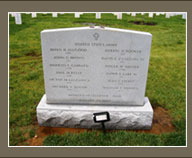 A mass grave marker at Arlington National Cemetery honors the 12 soldiers killed when their UH-60 Black Hawk helicopter was shot down near Baghdad on Jan. 20, 2007. Courtesy photo