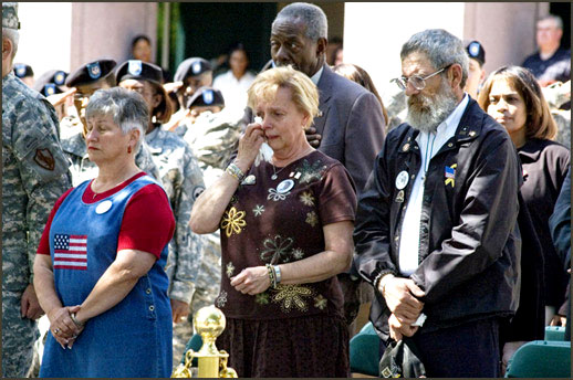 Carolyn and Keith Maupin fight back tears during a memorial service honoring their fallen son, Army Staff Sgt. Matt Maupin, at the Army Reserve Command headquarters at Fort McPherson, Ga., May 22, 2008. Photo by Timothy L. Hale
