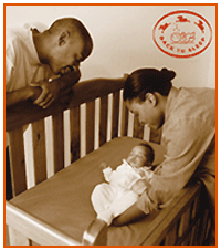 image of parents and a baby