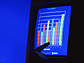 Pictoral representation of data (a graph) represented on a lighted computer screen.