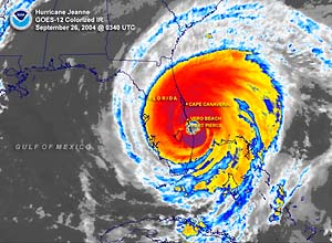 Colorized infrared satellite image of Hurricane Jeanne near landfall on September 26, 2004