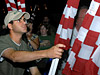 Army Pfc. Mohamed Mustafa, Virginia Army National Guard soldier and George Mason University ROTC cadet, participates in an American flag dedication at the Pentagon Sept. 10, 2008. The dedication was headed by the Healing Field Foundation, and about 200 volunteers were on hand to place and set up nearly 3,000 American flags in the Pentagon parking lot in honor of the victims and families of the 9/11 attacks. Defense Dept. photo by Army Staff Sgt. Michael J. Carden