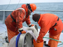 Spraying down the bongo nets.