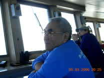 Image of John, a native Alaskan Inupiaq, on a bridge watch.