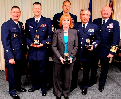 Photo of MCPOCG Charles "Skip" Bowen, DCC Steven Simpson, Dr. Laurel Goulet, LCDR Olav Saboe, Mr. Alfred Verdi, and ADM Thad Allen.