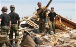 GUARD HELPS TORNADO VICTIMS - Click for high resolution Photo
