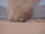 researchers chase a large dust devil on June 8