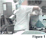 Figure 1 - Kitchen worker using extended/elevated reach