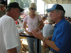 Senator Hakin talks with Paul Vande Noord who’s flooded farm Harkin visited earlier this summer