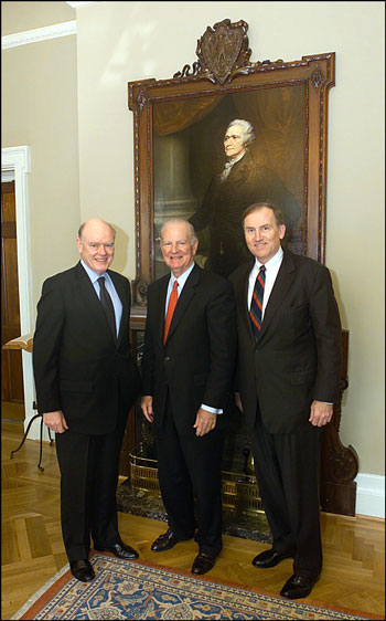 Treasury Secretary John Snow and Deputy Secretary Robert Kimmitt meet with Secretary Jim Baker at the Treasury Department
