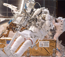 Image of an astronaut on a spacewalk during a previous servicing mission.