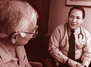 Image of doctor talking with male patient