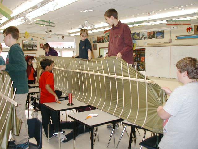 Photo of Orono students working on wings