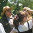 A park ranger leading a guided tour for elementary school children.