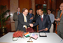 a photo of NIBIB Director Dr. Roderic Pettigrew shaking hands with Dr. Maharaj Bhan