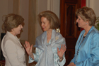 First Lady Laura Bush speaks with Women Business Leaders Summit co-sponors, Bonnie McElveen-Hunter and Under Secretary Karen Hughes at a White House reception, May 2007. State Department Photo