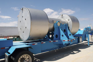 An empty TRUPACT-II is loaded onto a trailer. TRUPACT-IIs are sent to the generator sites empty and return with transuranic waste for disposal.