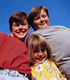 Image of an obese boy with his sister and brother