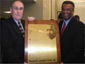 Executive Sims is pictured with former King County Councilmember Bruce Laing.  In 1986, Sims and Laing co-sponsored the motion setting forth the historical basis for renaming King County after the Reverend Dr. Martin Luther King, Jr. View the motion, which was passed on Feb. 24, 1986, at http://www.metrokc.gov/exec/mlk/motion.htm.