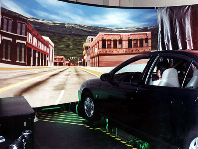 Researchers at TFHRC use the highway driving simulator (shown here) to study nighttime visibility on rural roads and other driving circumstances.
