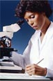 researcher with microscope