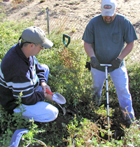 ORISE employees taking soil samples