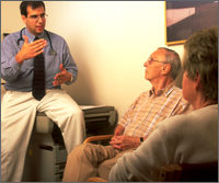 a doctor talking with patients