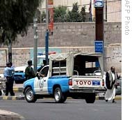 Yemeni policemen, soldiers stand guard near U.S. Embassy in Sanaa, 17 Sep 2008