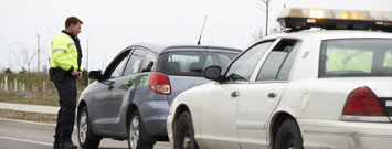 Cop pulled over a car to check seat belts