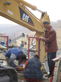 Bejtullah Kciku oversees installation of equipment at Bejta Commerce’s new quarry.