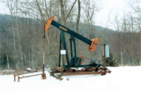 Photo of a typical well pump jack used in the Allegheny National Forest.