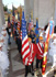 Veterans Service Organization members prepare for the Parade of Flags march into the Memorial Amphitheater 