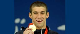 Photo of Michael Phelps with gold medal