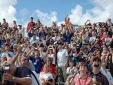 Students, teachers and spectators watch Discovery launch.