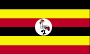 Flag of Uganda is six equal horizontal bands of black - top - yellow, red, black, yellow, and red; white disk is superimposed at center and depicts red-crested crane facing hoist side.