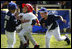  Reggie Graff, right, age 6, from St. George, Utah, tags North Carolina's Avery Shane, age 5, center, as Hawaii's Joshua Miyazawa, age 5, watches during All-Star tee ball action on July 16, 2008 on the South Lawn of the White House. Shane, from Rutherfordton, N.C., was on the Southern team and Graff and Miyazawa, from Honolulu were on the Western team. Two other teams, representing the Central and Eastern sections of the country, played and one child represented each state. President George W. Bush and Mrs. Laura Bush watched the action from a bleachers set up on the grounds for the kids' families.