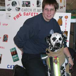 Cody, the fire safety dalmatian, with his handler, Fire Investigator Amy Linder of the Yakima County (WA) Fire Protection Bureau.