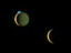 image of two moons over Jupiter