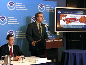 NOAA image of NOAA lead hurricane forecaster Gerry Bell addressing reporters at a Washington, D.C. news conference.