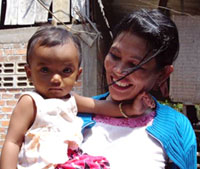 Photo of an HIV-positive woman with her daughter in Cambodia.