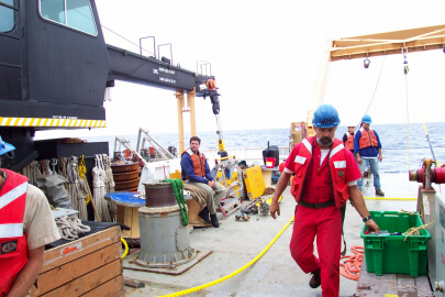 picture is of the crew working on deck.