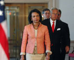 Secretary Rice is followed by Under Secretary Reuben Jeffery, EUR Deputy Assistant Secretary Matt Bryza and Deputy Director of Foreign Assistance Richard Green to make the announcement of economic aid to Georgia on September 3, 2008. [© AP image]