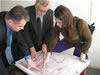 Chop's Mayor Volodymyr Gorynetsky demonstrates strategic map of the city to MBR specialists