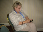 workshop participant with handheld device